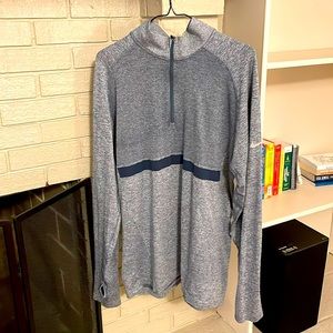 Men’s Nike half-zip dri- fit long sleeve shirt. Size XXL.